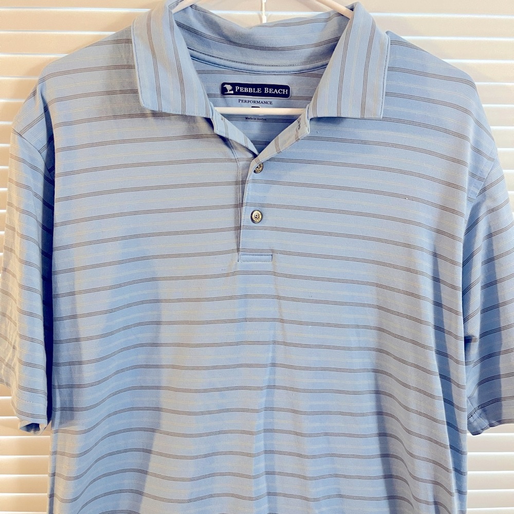 Used people beach light blue pin stripe polo shirt.